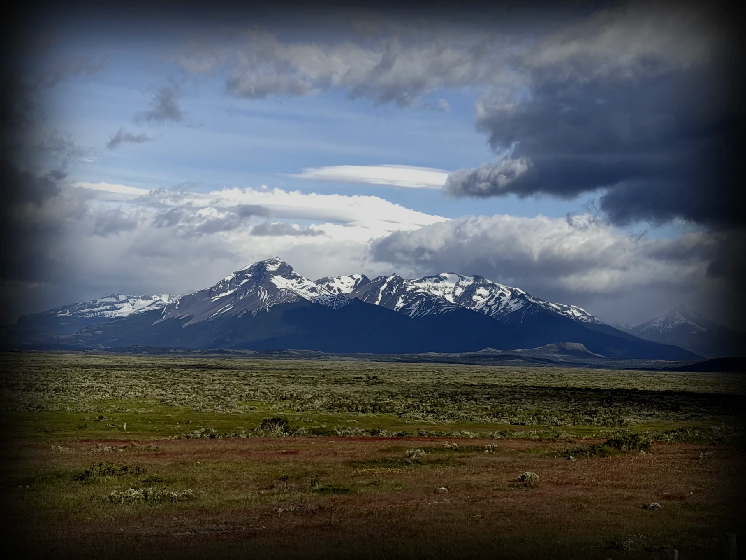 The Patagonian steppe stretching toward snow-capped Andes
